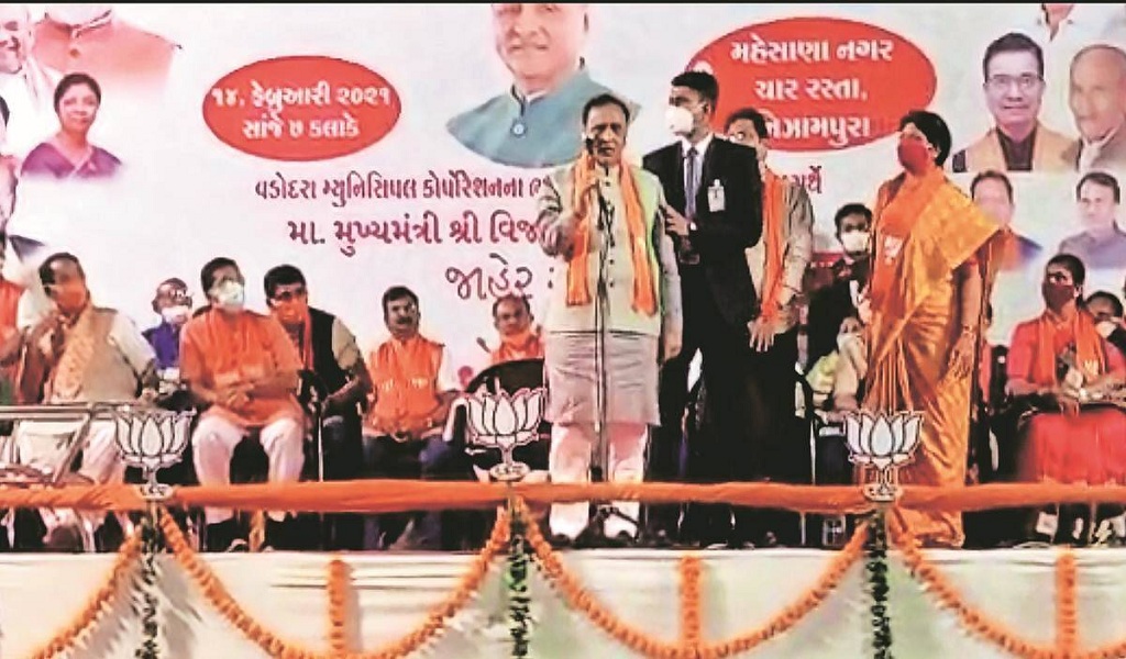 'NOTICEABLY EXHAUSTED,' RUPANI FAINTS DURING THE VADODARA ELECTIONS RALLY