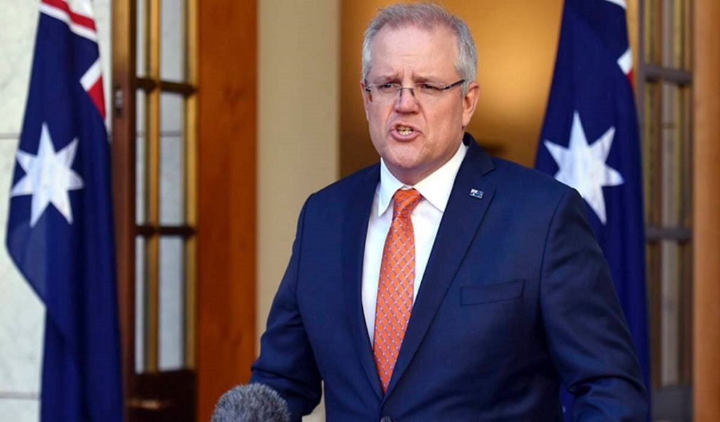 Scott Morrison apologises woman over assault allegations
